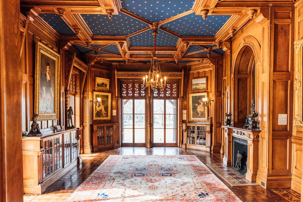 Wood-paneled gallery inside the Newport Art Museum