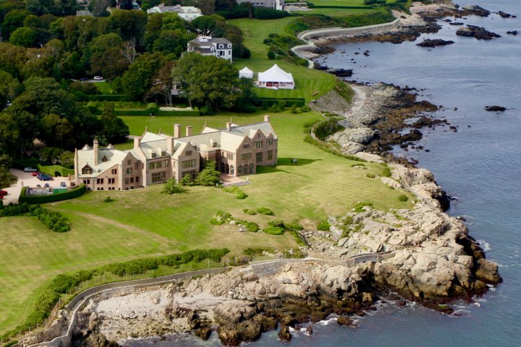 Aerial view of Rough Point mansion on Newport’s rocky coastline