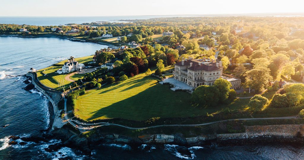 Aerial view of Newport mansions and the coastal Cliff Walk