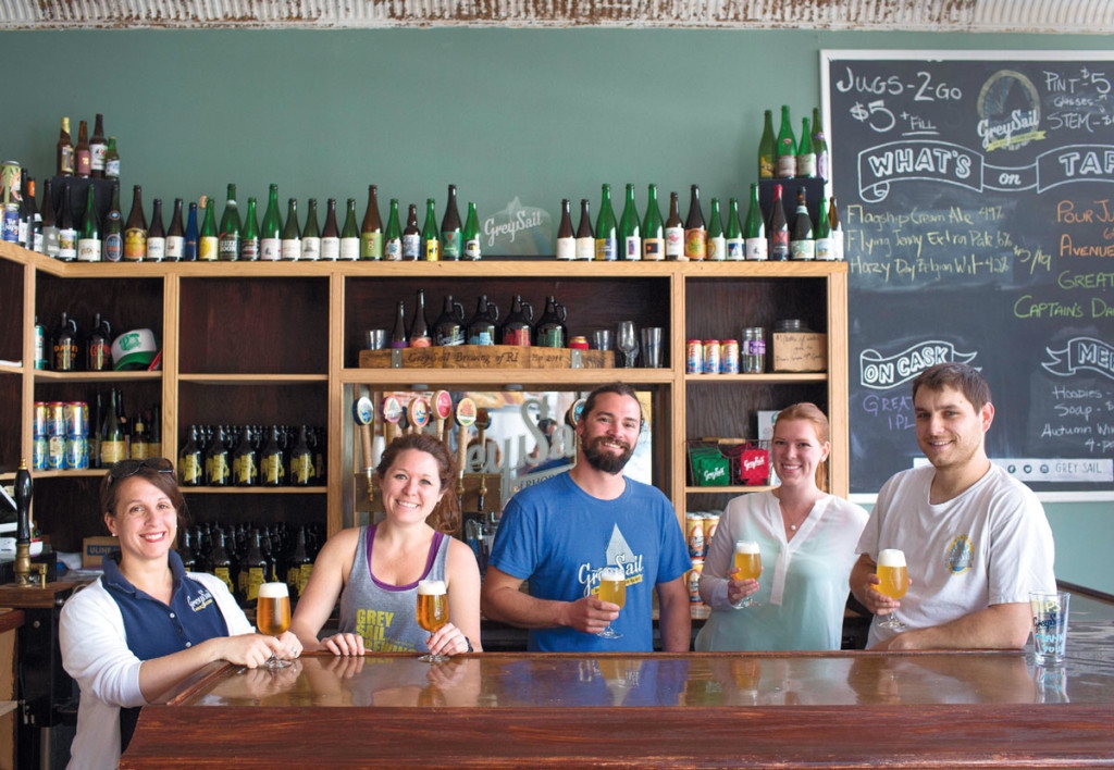 Grey Sail Brewing team serving beer behind the Westerly taproom bar