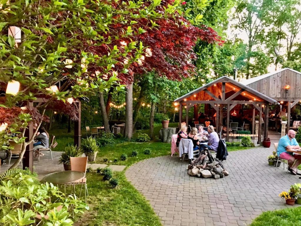Garden dining area at The Tree House Tavern and Bistro in Warwick